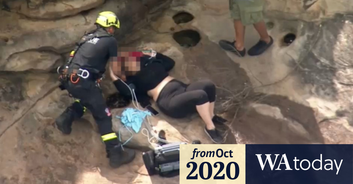 Video Rescue operation underway after woman falls off cliff
